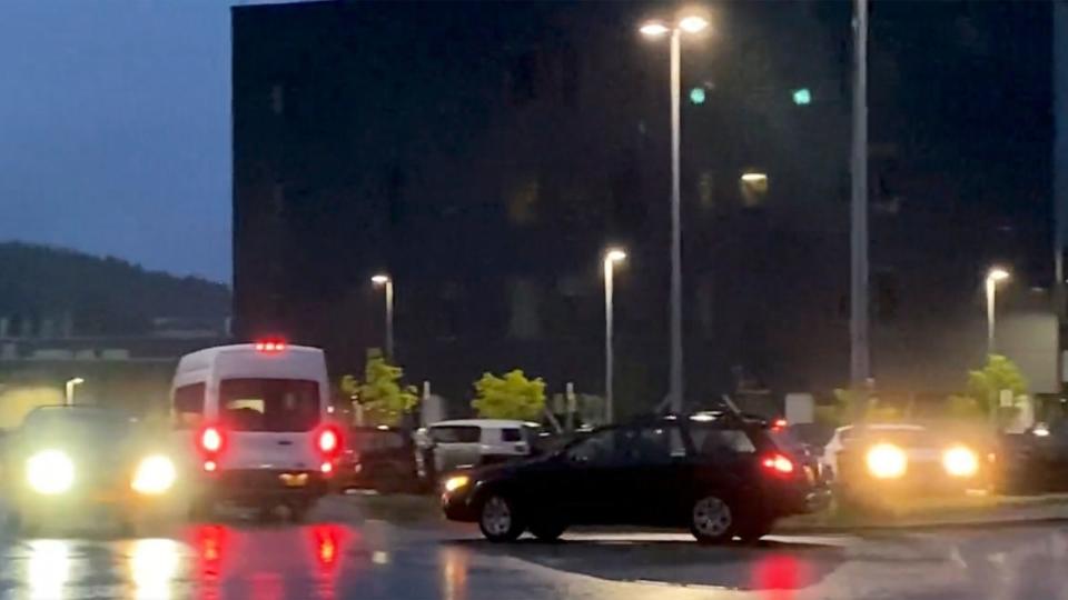 PHOTO: This image made from the video posted to social media by Jared Griffin shows vehicles around Kodiak High School following the earthquake, in Kodiak, Alaska, Saturday, July 15, 2023. (Jared Griffin via AP)