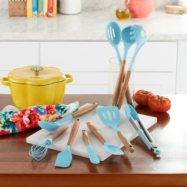 <p><a href="https://go.redirectingat.com?id=74968X1596630&url=https%3A%2F%2Fwww.walmart.com%2Fip%2FThe-Pioneer-Woman-10-Piece-Silicone-and-Acacia-Wood-Handle-Cooking-Utensils-Set-Blue%2F141513094&sref=https%3A%2F%2F" rel="nofollow noopener" target="_blank" data-ylk="slk:Shop Now;elm:context_link;itc:0;sec:content-canvas" class="link ">Shop Now</a></p><p>The Pioneer Woman 10-Piece Cooking Utensil Set</p><p>$24.97</p><p>walmart.com</p>