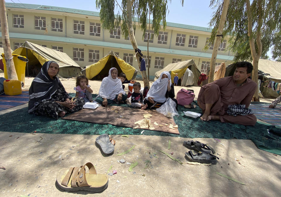 Internally displaced Afghans who fled their home due to fighting between the Taliban and Afghan security personnel, are seen at a camp in Daman district of Kandahar province south of Kabul, Afghanistan, Thursday, Aug. 5, 2021. (AP Photo/Sidiqullah Khan)