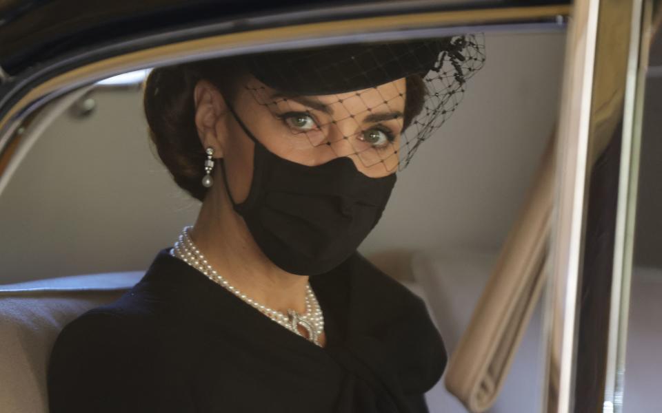 Britain's Catherine, Duchess of Cambridge, arrives to attend the funeral ceremony of Britain's Prince Philip, Duke of Edinburgh at St George's Chapel in Windsor Castle in Windsor, west of London, on April 17, 2021. - Philip, who was married to Queen Elizabeth II for 73 years, died on April 9 aged 99 just weeks after a month-long stay in hospital for treatment to a heart condition and an infection. (Photo by CHRIS JACKSON / POOL / AFP) (Photo by CHRIS JACKSON/POOL/AFP via Getty Images)