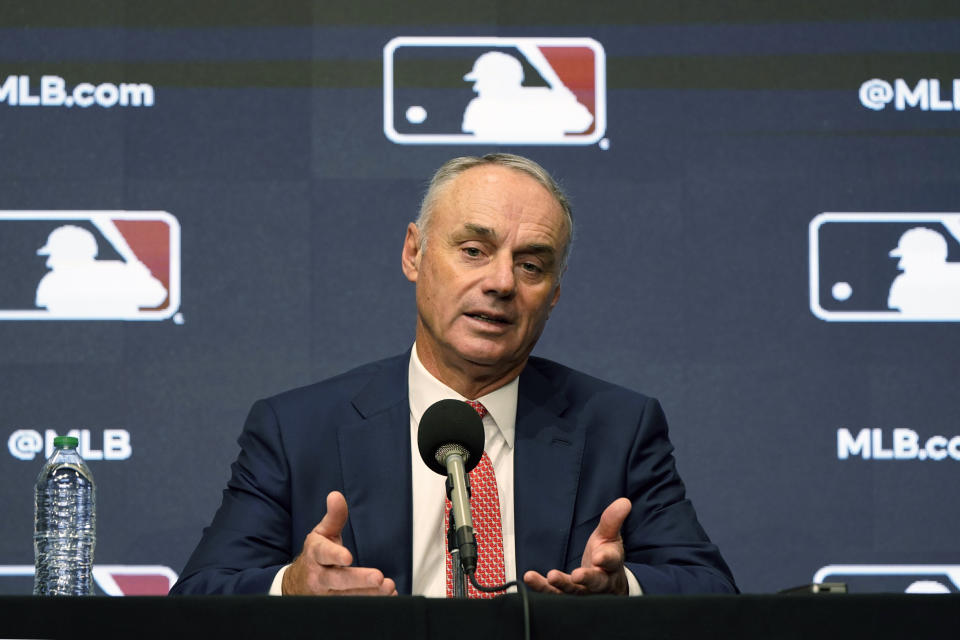 Major League Baseball commissioner Rob Manfred speaks during a news conference in Arlington, Texas, Thursday, Dec. 2, 2021. Owners locked out players at 12:01 a.m. Thursday following the expiration of the sport's five-year collective bargaining agreement. (AP Photo/LM Otero)