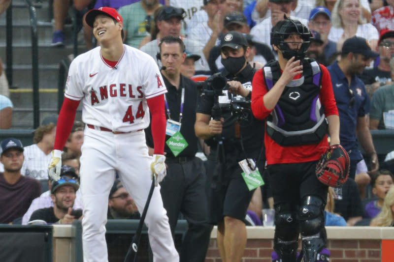 Interpreter Ippei Mizuhara (R) often was seen alongside MLB star Shohei Ohtani, including when he worked as a catcher for him during the 2021 Home Run Derby. File Photo by Bob Strong/UPI