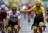 Cycling - The 104th Tour de France cycling race - The 103-km Stage 21 from Montgeron to Paris Champs-Elysees, France - July 23, 2017 - Team Sky riders Michal Kwiatkowski of Poland and yellow jersey Chris Froome of Britain on the finish line. REUTERS/Christian Hartmann