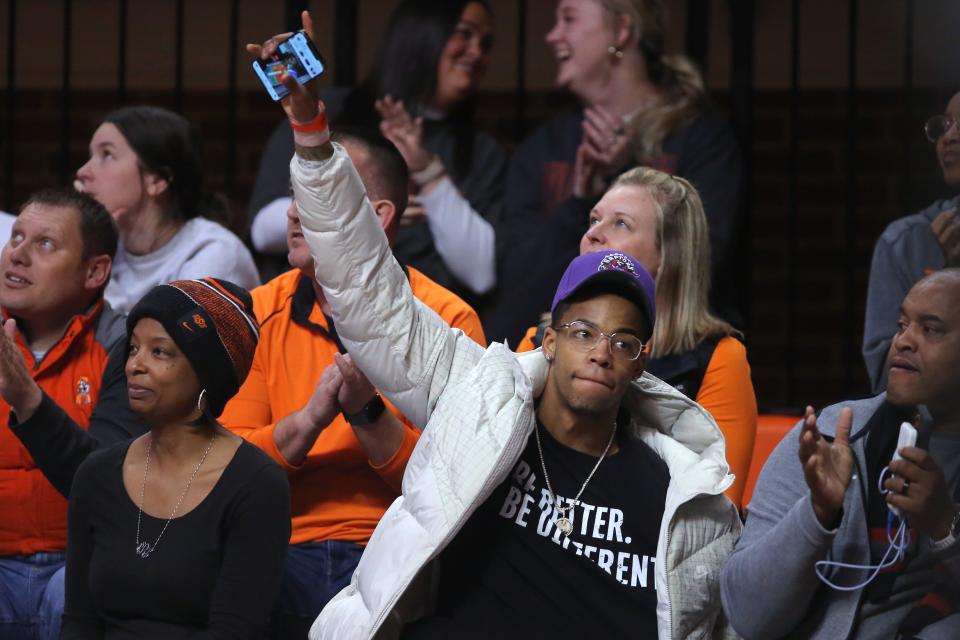 Avery Anderson III waves to the crowd during a men's college basketball game between the Oklahoma State University Cowboys (OSU) and the Texas Tech Red Raiders at Gallagher-Iba Arena in Stillwater, Okla., Wednesday, Feb. 8, 2023. Oklahoma State won 71-68.