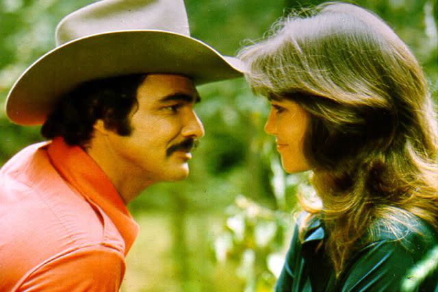Michael Ochs Archives/Getty Burt Reynolds and Sally Field in <em>Smokey and the Bandit</em> (1977)