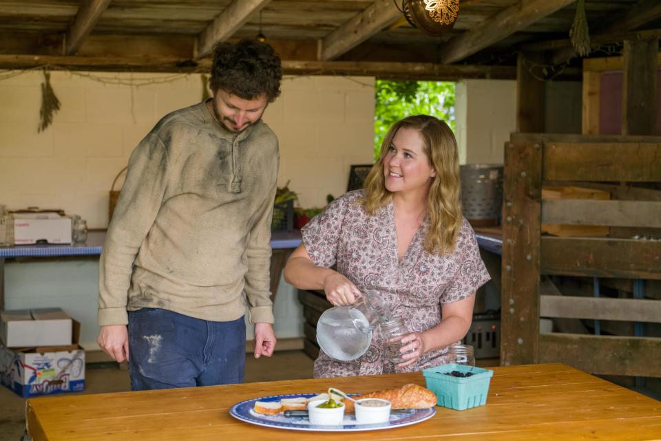 Michael Cera plays John, a very direct farmer who intrigues Beth (Amy Schumer).