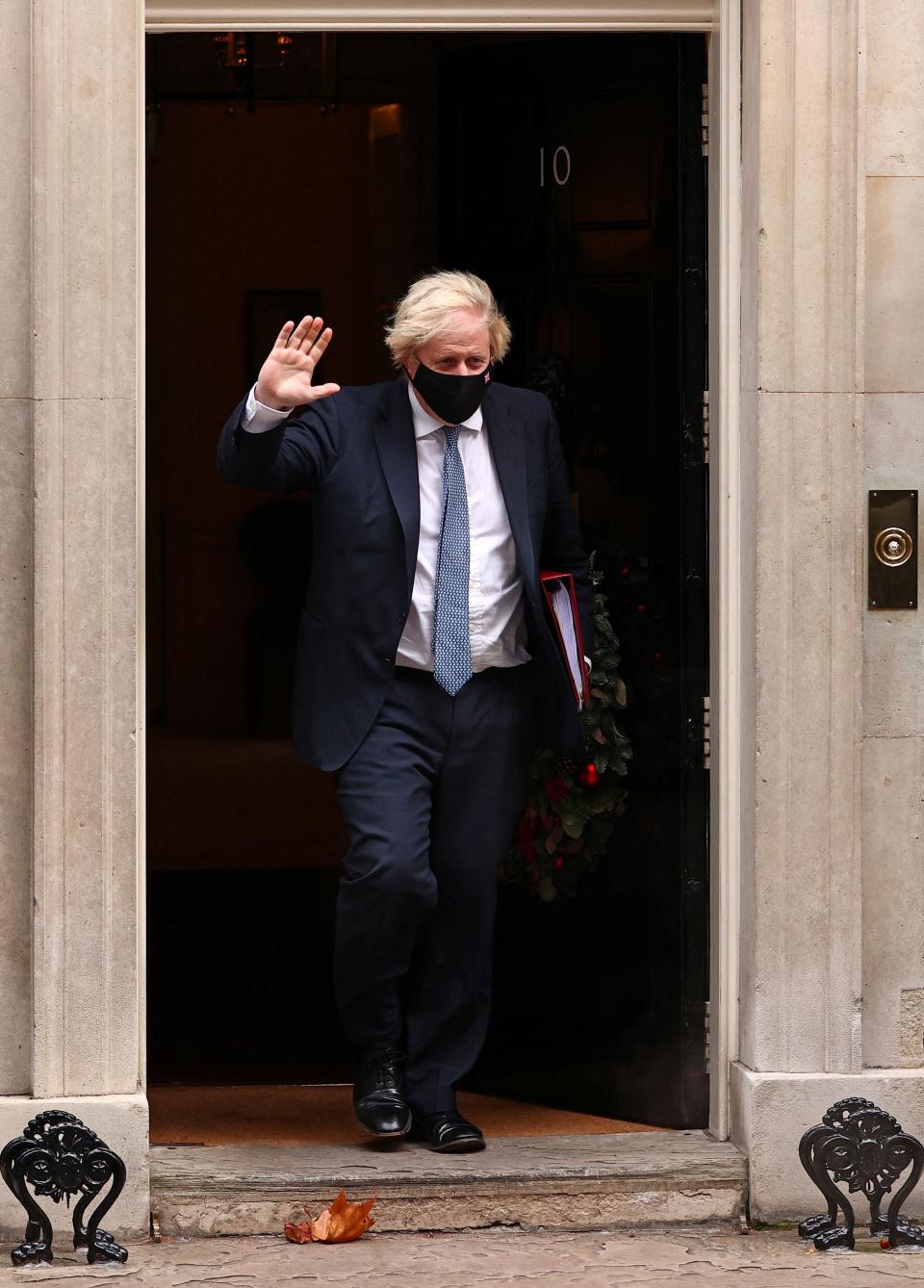 Boris Johnson leaving for PMQs (AFP via Getty Images)