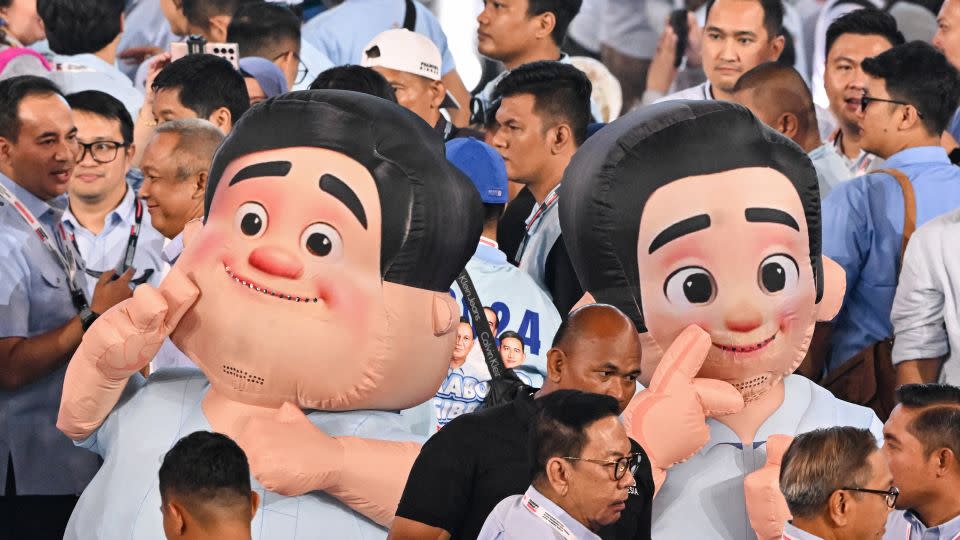 Mascots depicting presidential candidate and Indonesia's Defence Minister Prabowo Subianto (L) and vice presidential candidate Gibran Rakabuming Raka (R) in an election event on February 5, 2024. - Adek Berry/AFP/Getty Images