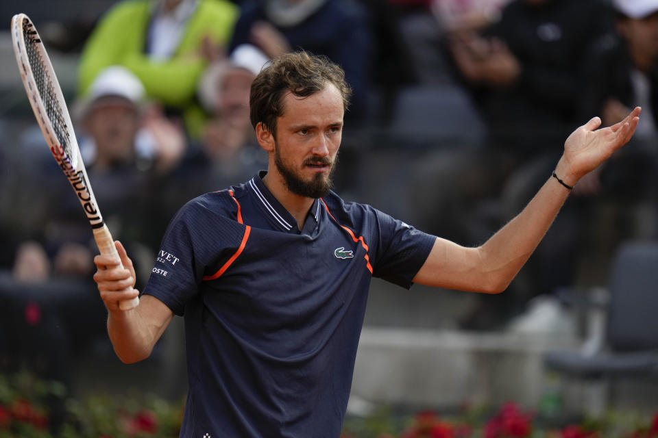 Daniil Medvedev of Russia celebrates after winning a point against Denmark's Holger Rune during the men's final tennis match at the Italian Open tennis tournament in Rome, Italy, Sunday, May 21, 2023. (AP Photo/Alessandra Tarantino)