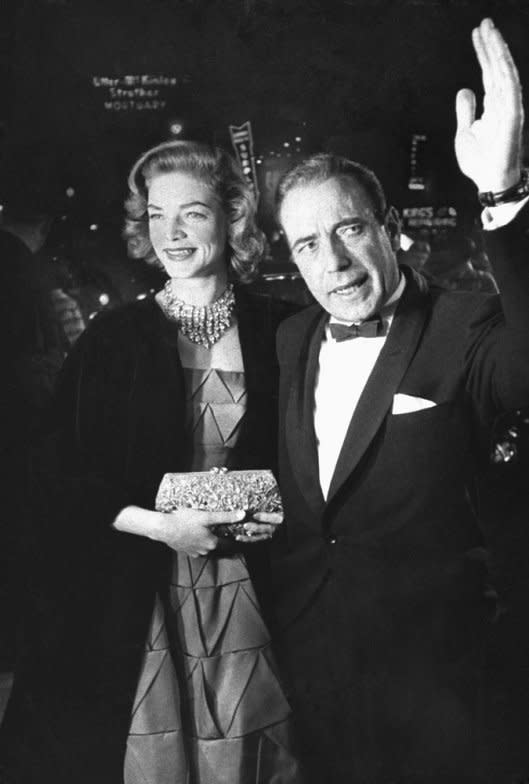 Humphrey Bogart and his wife Lauren Bacall arrive at the 27th annual Academy Awards at the RKO Pantages Theater in 1955. (George Silk—Time & Life Pictures/Getty Images) <br> <br> <a href="http://life.time.com/culture/oscars-classic-photos-from-hollywoods-biggest-night/#1" rel="nofollow noopener" target="_blank" data-ylk="slk:Click here to see the full collection at LIFE.com;elm:context_link;itc:0;sec:content-canvas" class="link ">Click here to see the full collection at LIFE.com</a>