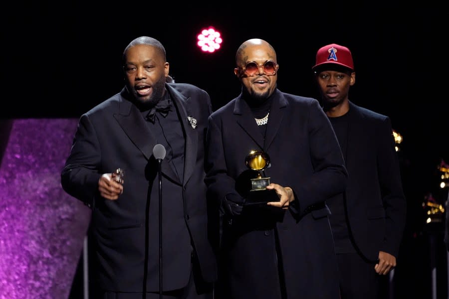 Killer Mike, left, accepts the award for best rap performance for “Scientists & Engineers” during the 66th annual Grammy Awards on Sunday, Feb. 4, 2024, in Los Angeles. (AP Photo/Chris Pizzello)