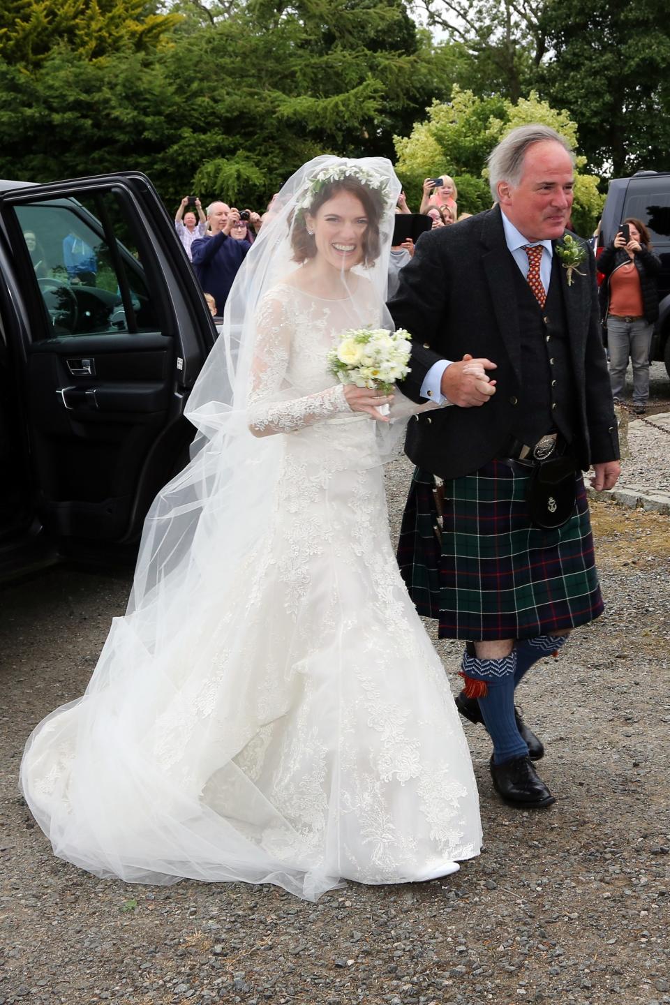 <p>WHO: Rose Leslie</p> <p>WHAT: Elie Saab</p> <p>WHERE: At her wedding to Kit Harington, Aberdeen, Scotland</p> <p>WHEN: June 23, 2018</p>