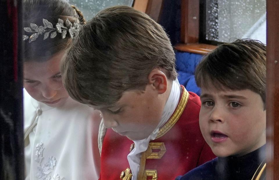 <p>Britain's Prince Louis of Wales, Britain's Prince George of Wales and Britain's Princess Charlotte of Wales travel back to Buckingham Palace from Westminster Abbey in central London on May 6, 2023, after the coronations of Britain's King Charles III and Britain's Queen Camilla. - The set-piece coronation is the first in Britain in 70 years, and only the second in history to be televised. Charles will be the 40th reigning monarch to be crowned at the central London church since King William I in 1066. (Photo by Mosa'ab Elshamy / POOL / AFP) (Photo by MOSA'AB ELSHAMY/POOL/AFP via Getty Images)</p> 