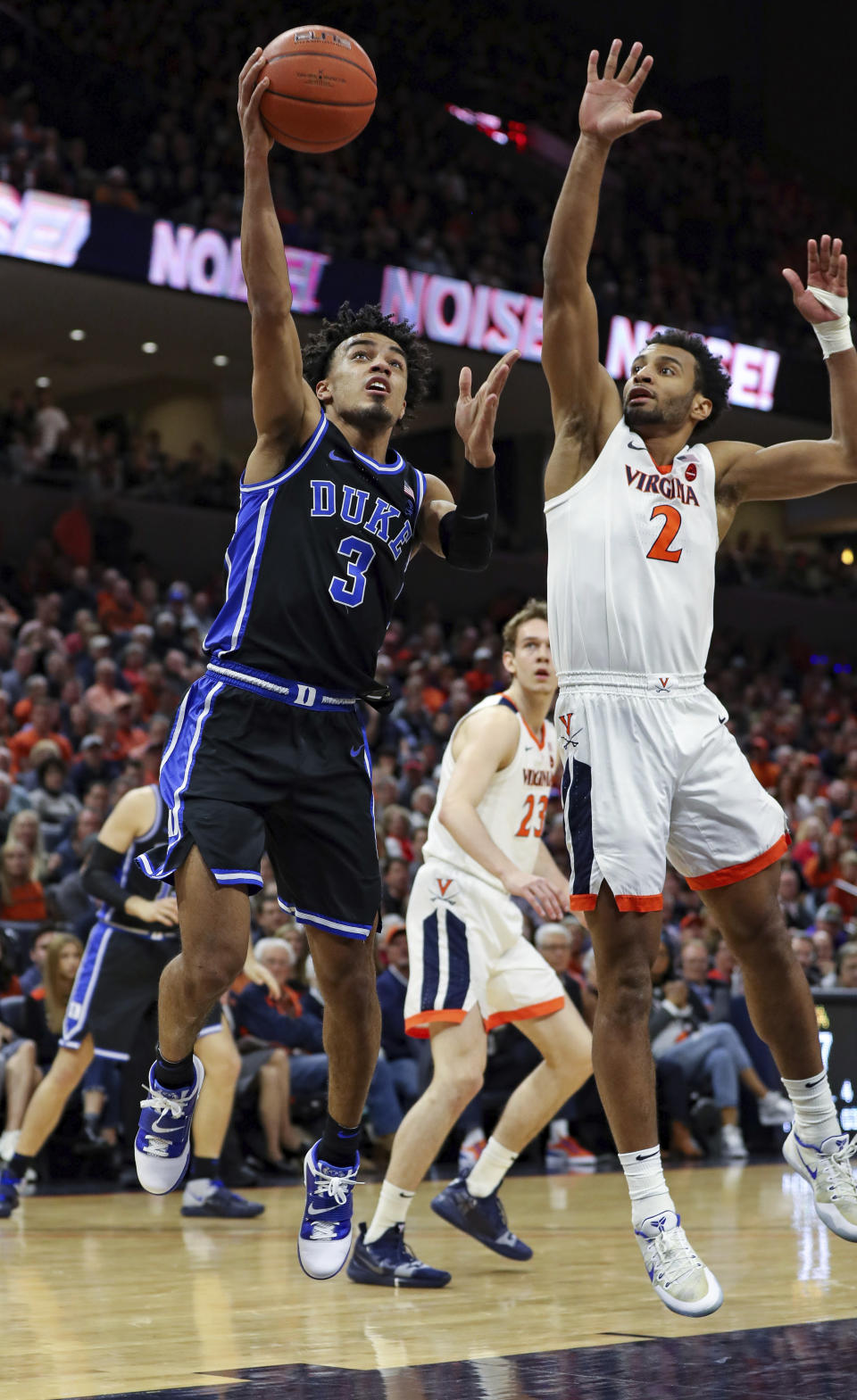 Duke guard Tre Jones (3) shoots as Virginia guard Braxton Key (2) defends during an NCAA college basketball game Saturday, Feb. 29, 2020, in Charlottesville, Va. (AP Photo/Andrew Shurtleff)