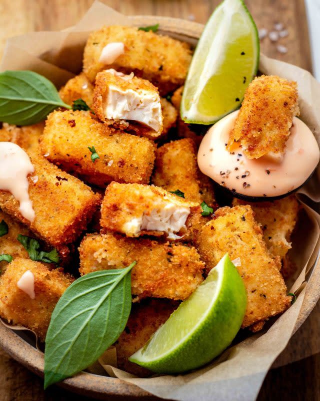 <p>The Guccha</p><p>Simple to make restaurant-style appetizer using silken tofu and other vegan ingredients. Serve this crispy fried silken tofu with an instantly made dipping sauce that is so yummy!</p><p><strong>Get the recipe: <a href="https://www.theguccha.com/crispy-fried-silken-tofu/" rel="nofollow noopener" target="_blank" data-ylk="slk:Crispy Fried Silken Tofu;elm:context_link;itc:0;sec:content-canvas" class="link "><em>Crispy Fried Silken Tofu</em></a></strong></p>