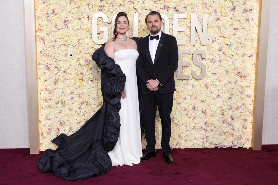 Lily Gladstone, left, and Leonardo DiCaprio arrive at the 81st Golden Globe Awards on Sunday, Jan. 7, 2024, at the Beverly Hilton in Beverly Hills, Calif. (Photo by Jordan Strauss/Invision/AP)