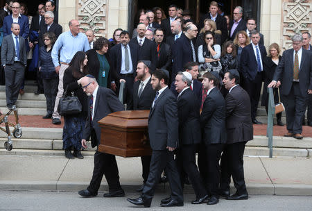 A casket is carried from Rodef Shalom Temple after funeral services for brothers Cecil and David Rosenthal, victims of the Tree of Life Synagogue shooting, in Pittsburgh, Pennsylvania, U.S., October 30, 2018. REUTERS/Cathal McNaughton