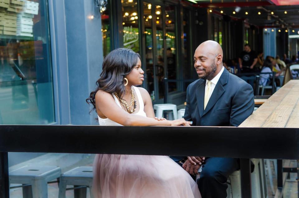 Danielle Inez, left, talks with her mentor Ricky Wilkins. Wilkins died Thursday at 58 years old.