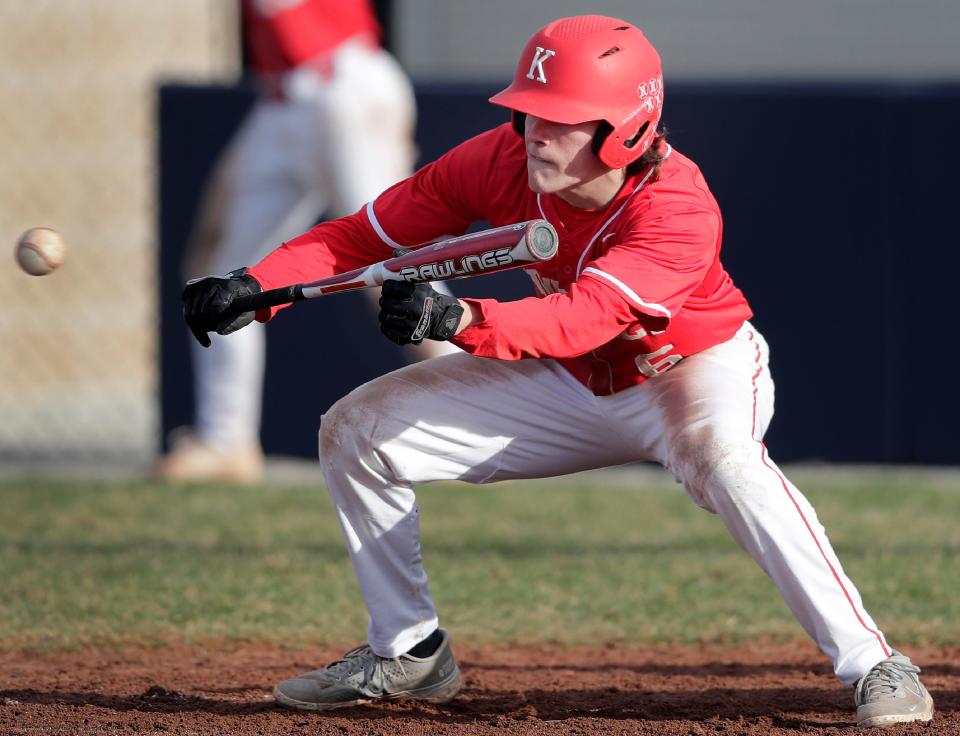 Kimberly's Kale Twombly attempts a bunt during a game against Appleton North on May 3. Kimberly is the top-ranked team in the latest Post-Crescent baseball rankings.