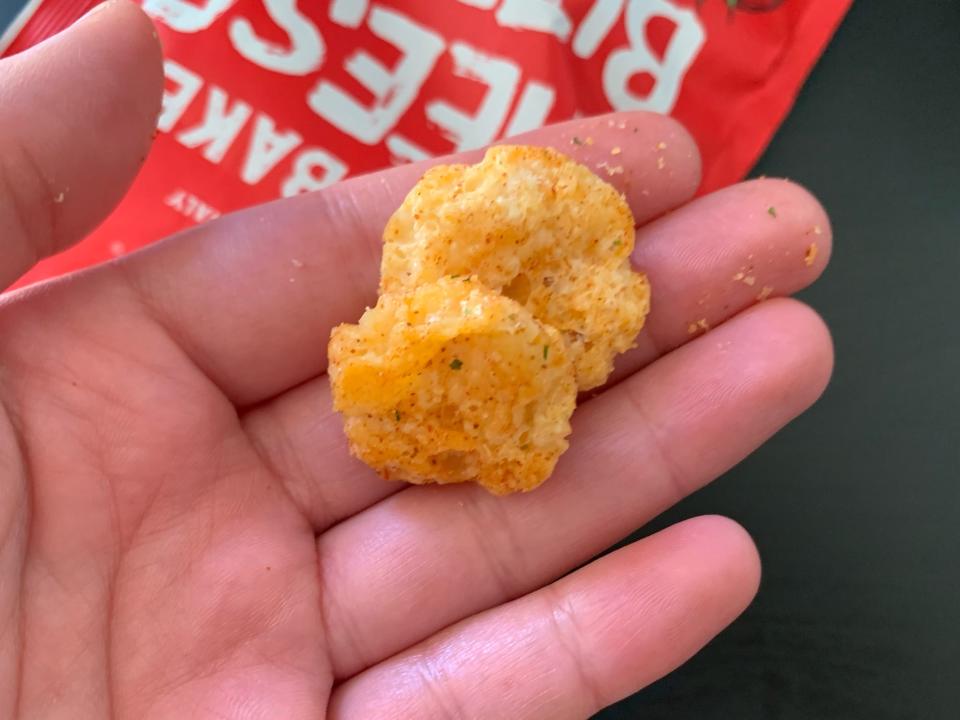 hand holding some of trader joe's cheese bites