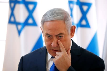 FILE PHOTO: Israeli Prime Minister Benjamin Netanyahu gestures during a weekly cabinet meeting in the Jordan Valley, in the Israeli-occupied West Bank