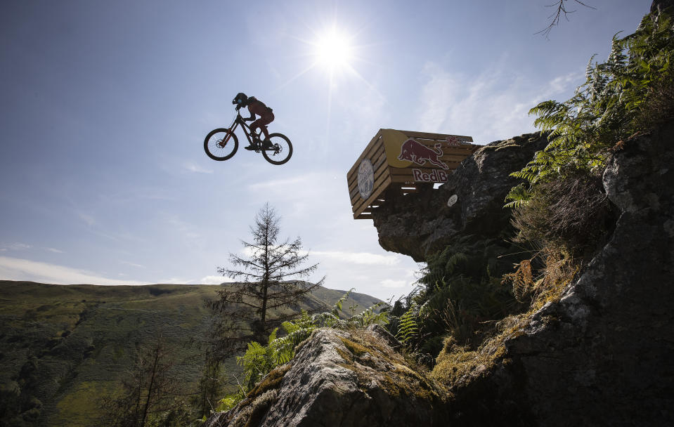 <p>EDITORIAL USE ONLY New Zealand's Sam Gale participates in the Red Bull Hardline 2021 competition in Dyfi Valley, Wales. Picture date: Sunday July 25, 2021.</p>
