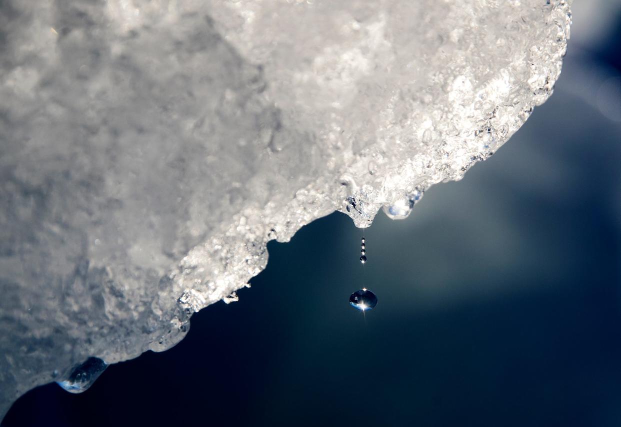 water drips from iceberg