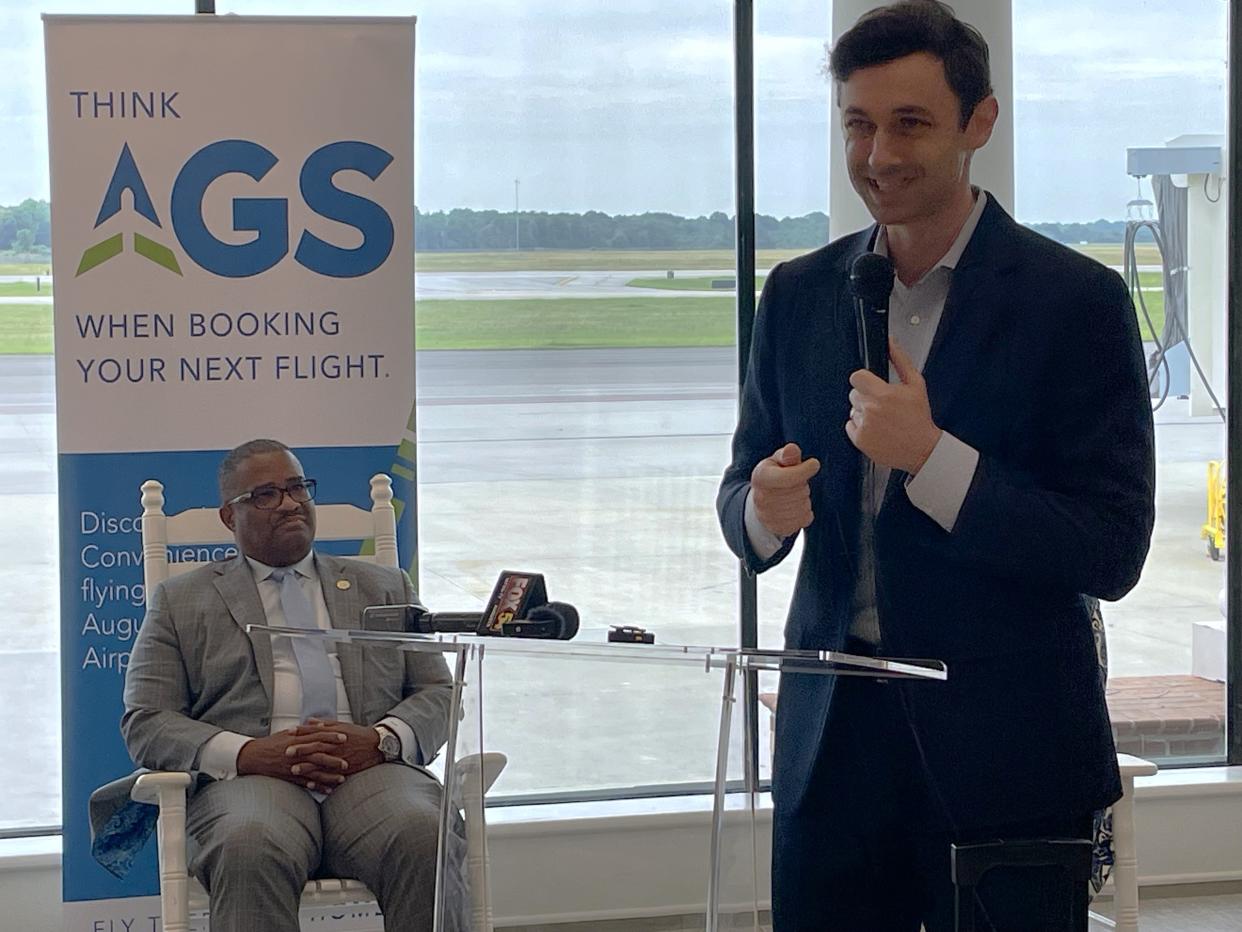 As Augusta Mayor Garnett Johnson looks on, U.S. Sen. Jon Ossoff delivers remarks at the expanded terminal at Augusta Regional Airport, Friday, May 17, 2024.