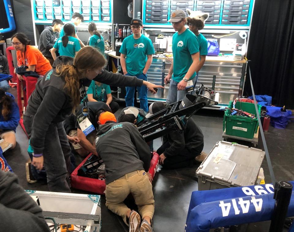 HighTide Robotics team members from Ventura County prep their robot during the FIRST championships in Houston Saturday.