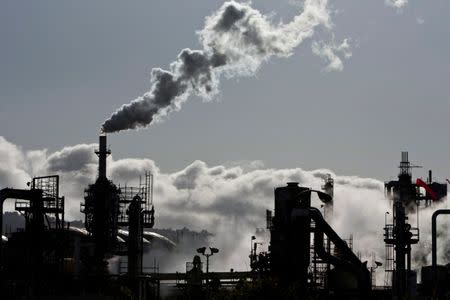 Vapor is released into the sky at a refinery in Wilmington, California March 24, 2012. REUTERS/Bret Hartman/Files