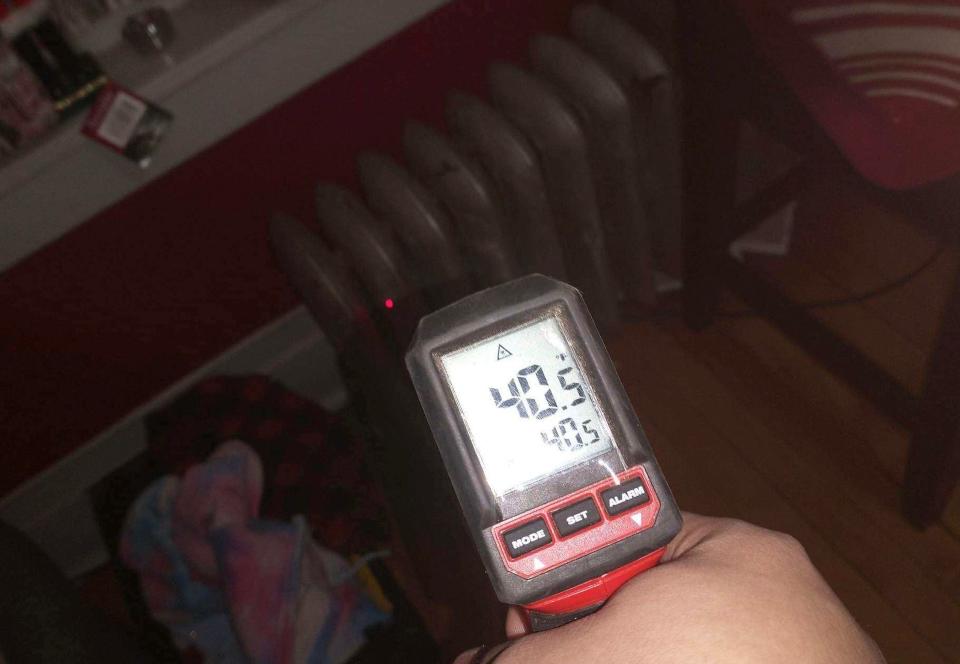 Bobbie Jo O'Dell shows electric thermometer dropping to 40.5°F in her apartment.
