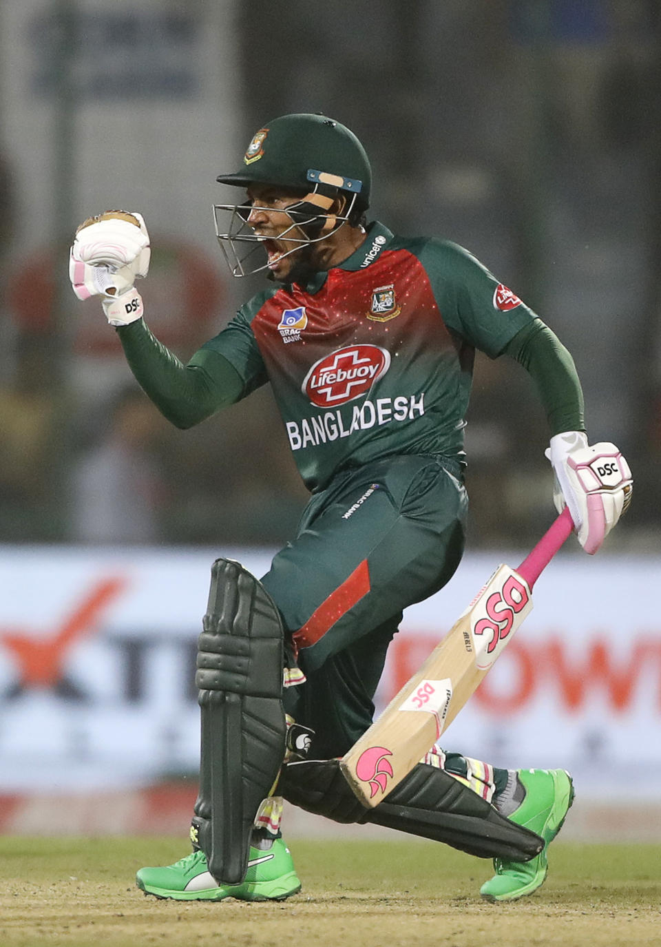 Bangladesh's Mushfiqur Rahim, right, celebrates after wining first T20 cricket match against India at the Arun Jaitley stadium, in New Delhi, India, Sunday, Nov. 3, 2019. (AP Photo/Manish Swarup)