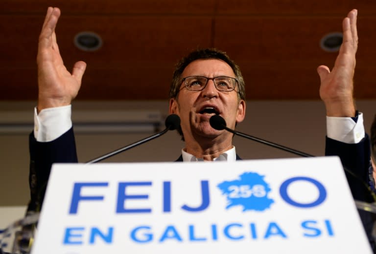 Current Galician regional president and Popular Party (PP) candidate for the regional election in Galicia, Alberto Nunez Feijoo, speaks at the PP headquarters in Santiago de Compostela after winning the election on September 25, 2016