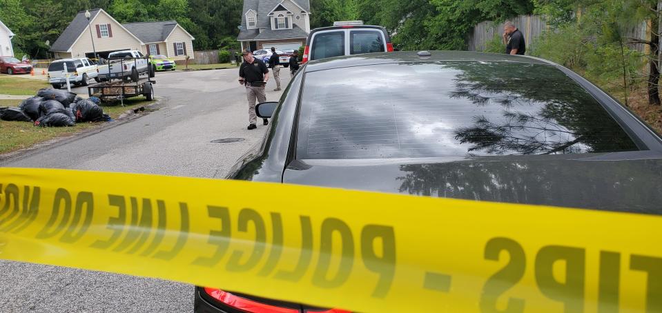 Fayetteville police work a scene in May 2021 on Ferndell Drive where a Fort Bragg soldier was shot. Spc. Kelia Horton, 22, was pronounced dead at the hospital. Sgt. Tiara Vinson, 26, has been charged with murder.