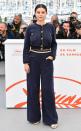Selena sports a navy Chanel cardigan with matching wide-leg pants, Tabitha Simmons sandals and Messika hoop earrings at the photocall for <em>The Dead Don't Die</em>.