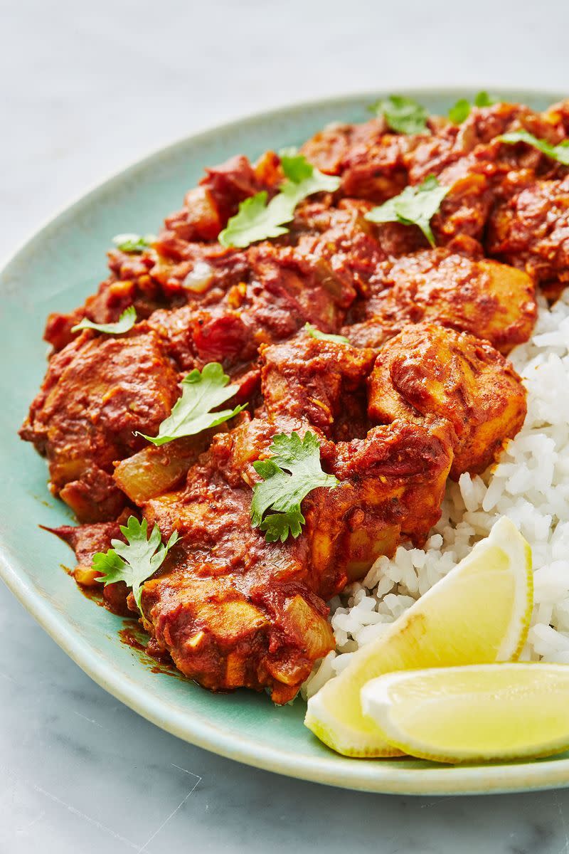 <p>We love this easy, healthy chicken bhuna recipe, a sure-fire dinner table win - the ultimate crowd pleaser.</p><p>Get the <a href="https://www.delish.com/uk/cooking/recipes/a28867202/chicken-bhuna/" rel="nofollow noopener" target="_blank" data-ylk="slk:Chicken Bhuna;elm:context_link;itc:0;sec:content-canvas" class="link ">Chicken Bhuna</a> recipe.</p>