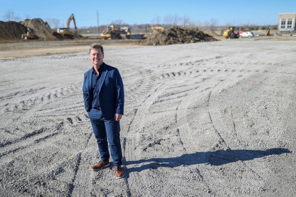 Travis Sheetz, president and CEO of Sheetz, stands in the lot at Vining Road and Wick Road in Romulus, Mich. where they plan to build a Sheetz gas station, Thursday, Feb. 29, 2024.