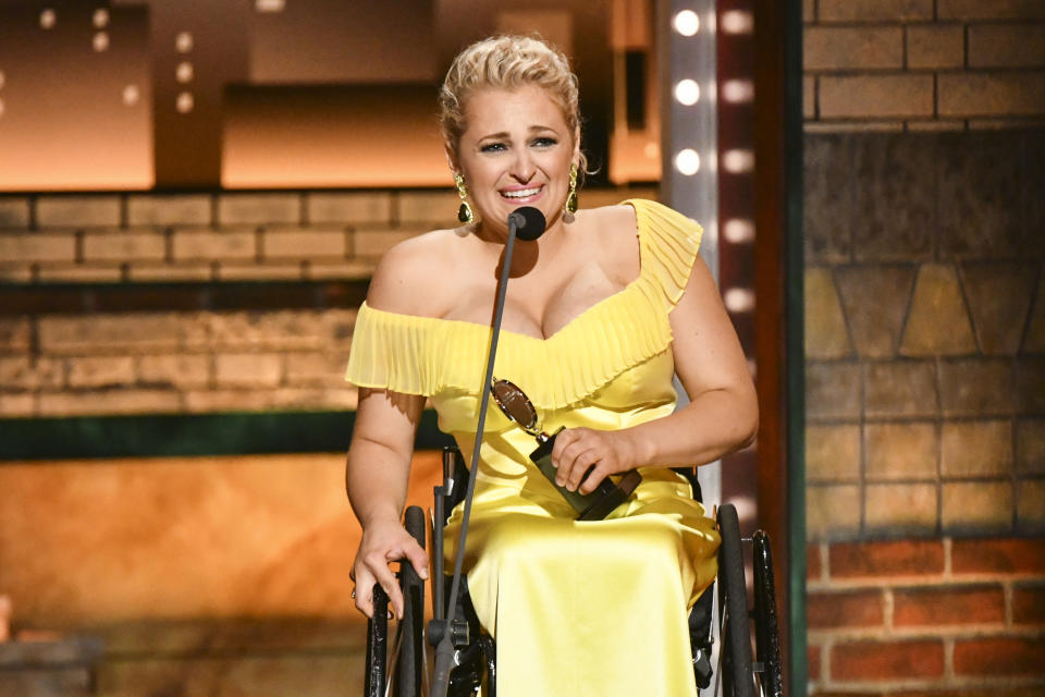 Ali Stroker accepts the award for best performance by an actress in a featured role in a musical for "Rodgers & Hammerstein's Oklahoma!"at the 73rd annual Tony Awards at Radio City Music Hall on Sunday, June 9, 2019, in New York. (Photo by Charles Sykes/Invision/AP)