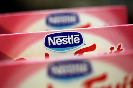 Boxes of baby food are seen in the company supermarket at the Nestle headquarters in Vevey, Switzerland, February 16, 2012. REUTERS/Denis Balibouse/File Photo