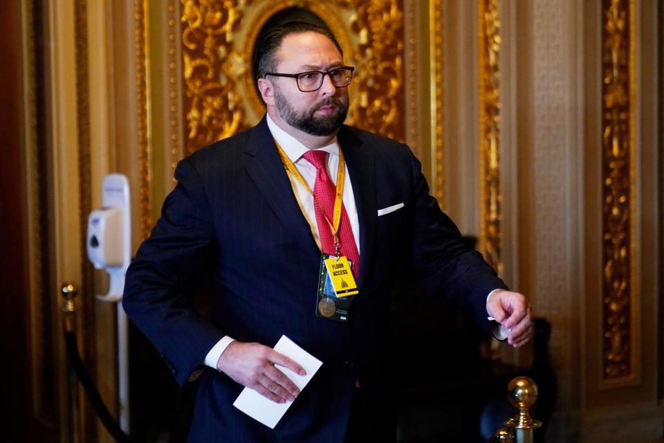 FILE -- Jason Miller, a senior adviser to former President Donald Trump during his 2020 re-election campaign, walks into the U.S. Capitol during Trump's second impeachment trial on Feb. 9, 2021, in Washington, D.C.  / Credit: ANDREW HARNIK/AFP via Getty Images