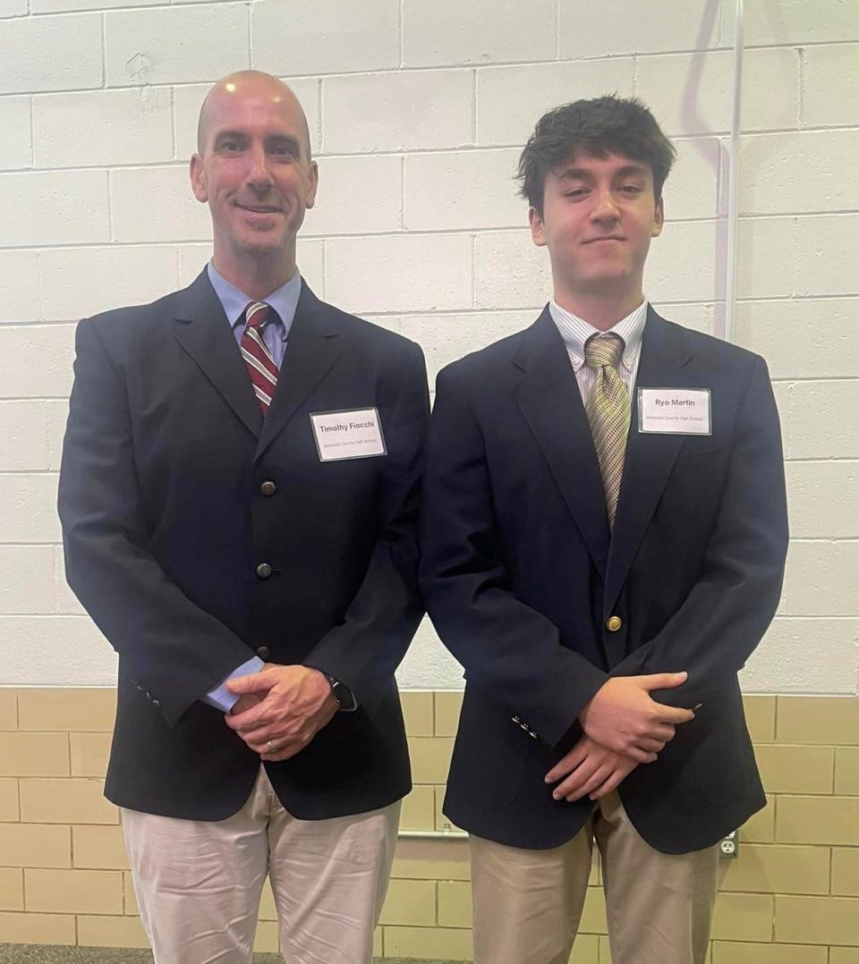 Ryo Martin (at right), Jefferson County High School's salutatorian and STAR Student, poses with his STAR Teacher, Tim Fiocchi.