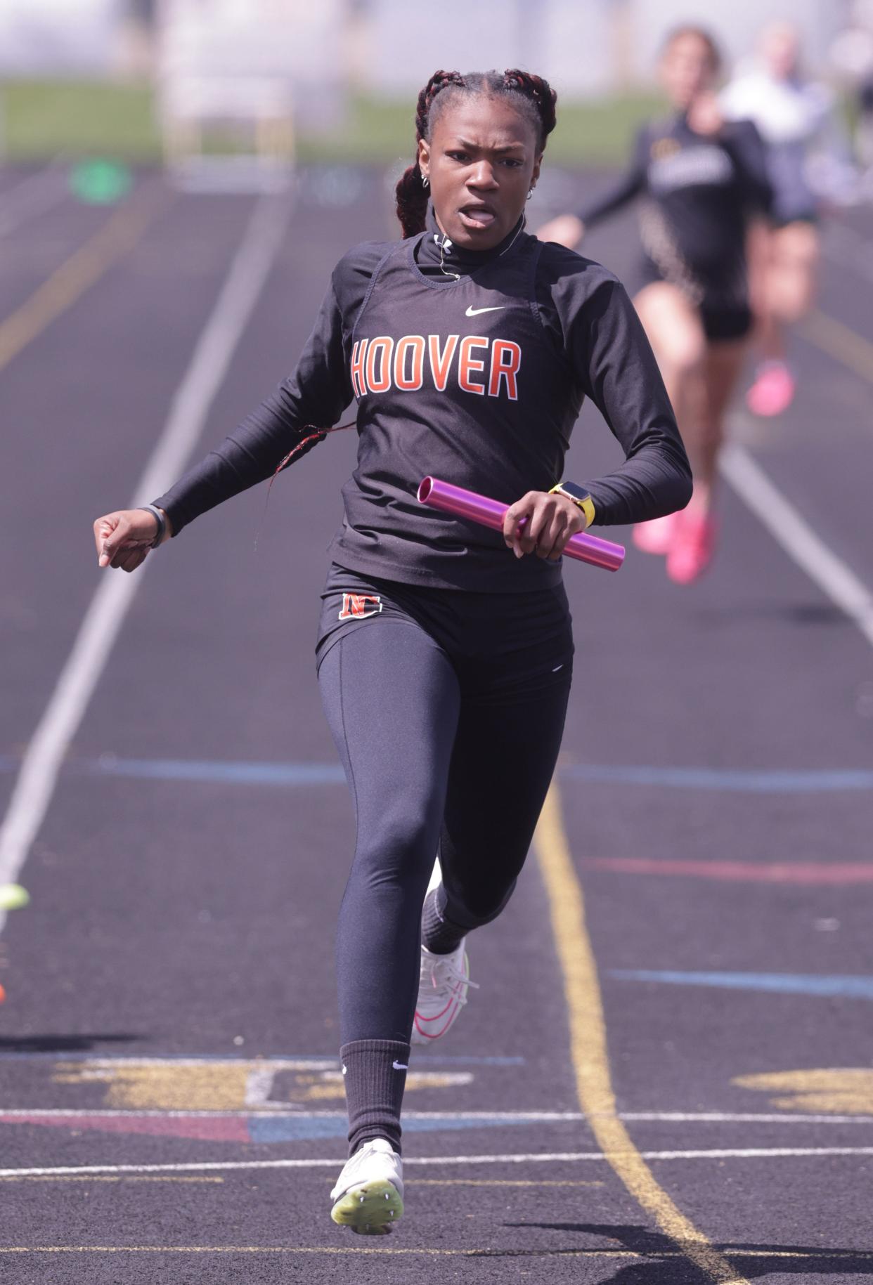 Hoovers Amahrie Harsh runs the anchor leg of the girls 800-meter relay at the Stark County Track and Field Championships on Saturday.