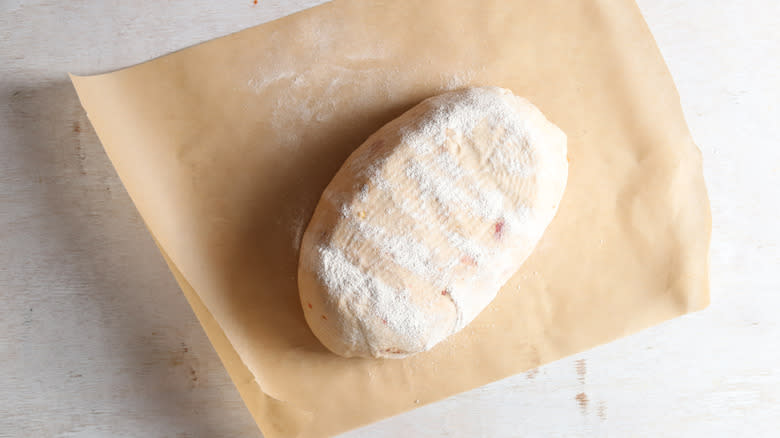 sourdough loaf on parchment paper