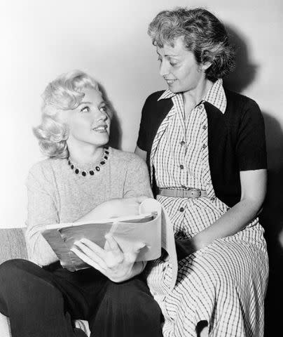 <p>Bettmann/Getty</p> Marilyn Monroe pictured with drama coach Natasha Lytess.