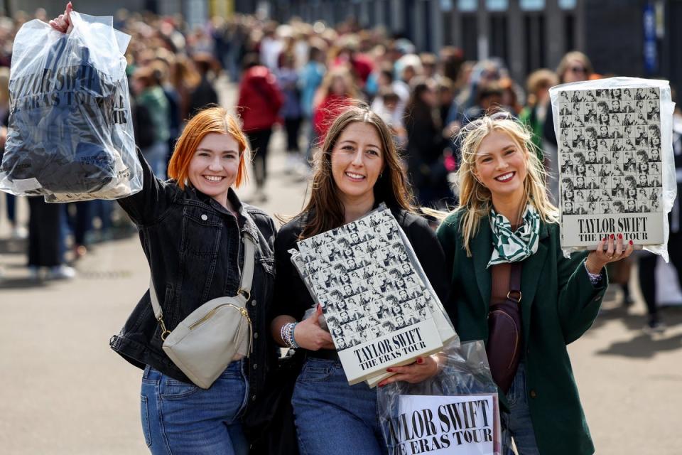 Swifties pose with their Taylor merch outside Murrayfield Stadium, Edinburgh (6 June) (Getty Images)