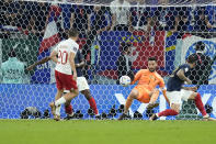 France's goalkeeper Hugo Lloris saves a ball during the World Cup round of 16 soccer match between France and Poland, at the Al Thumama Stadium in Doha, Qatar, Sunday, Dec. 4, 2022. (AP Photo/Ebrahim Noroozi)