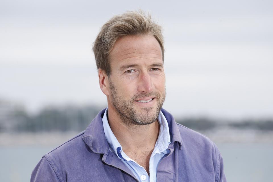 British writer Ben Fogle poses during a photocall for the TV show "The big catch" at the MIPCOM audiovisual trade fair in Cannes, southeastern France, on October 6, 2015. Held each year on the French Riviera, the audiovisual trade fair brings together the movers and shakers of the global entertainment business to network, talk shop and buy, sell and finance new content. AFP PHOTO / VALERY HACHE        (Photo credit should read VALERY HACHE/AFP/Getty Images)