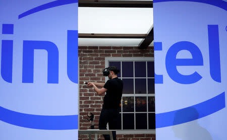 FILE PHOTO - Gameplayers demonstrate vitual reality headsets during the Intel press conference at CES in Las Vegas, Nevada, U.S. on January 4, 2017. REUTERS/Rick Wilking/File Photo