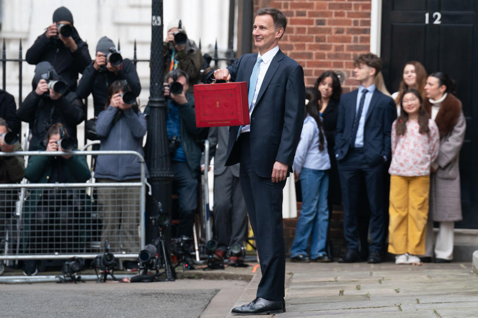 LONDON, ENGLAND - MARCH 06: Chancellor of the Exchequer, Jeremy Hunt, is seen outside 11 Downing Street with his ministerial box before delivering his Budget in the Houses of Parliament on March 06, 2024 in London, England. Chancellor Jeremy Hunt delivers his 2024 Spring Budget to Parliament. (Photo by Stefan Rousseau - WPA Pool/Getty Images)