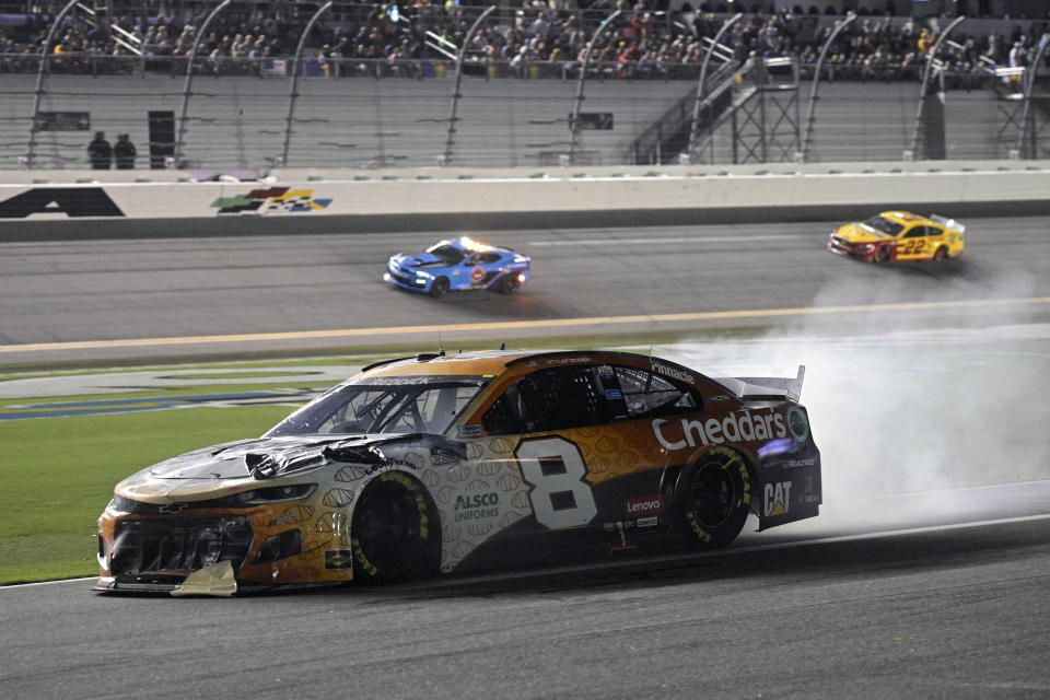 Tyler Reddick (8) heads down pit road after he was in a crash during a NASCAR Cup Series auto race at Daytona International Speedway, Saturday, Aug. 28, 2021, in Daytona Beach, Fla. (AP Photo/Phelan M. Ebenhack)